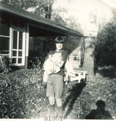 Young Candice with cat